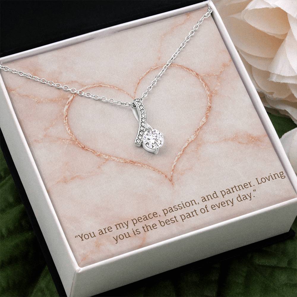 Dazzling Ribbon Necklace.  Yellow or White Gold with the message : You are my peace, passion, and partner. Loving you is the best part of every day.