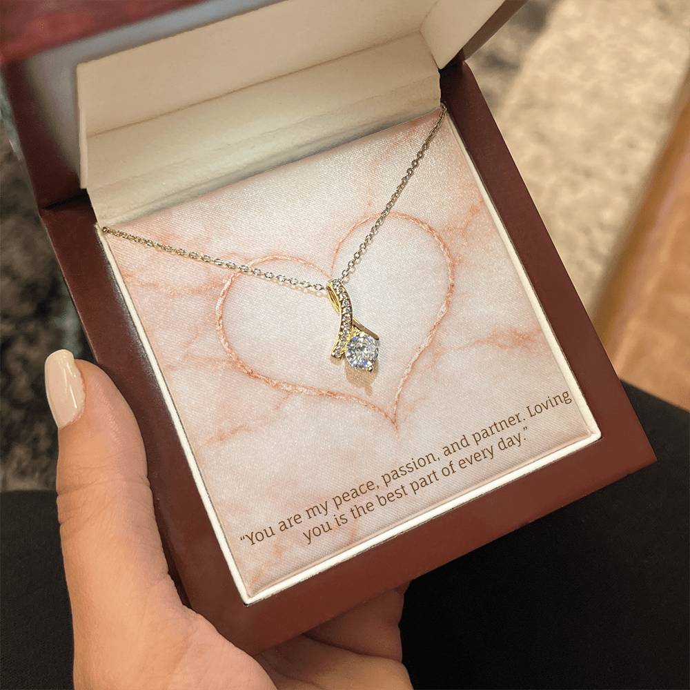 Dazzling Ribbon Necklace.  Yellow or White Gold with the message : You are my peace, passion, and partner. Loving you is the best part of every day.
