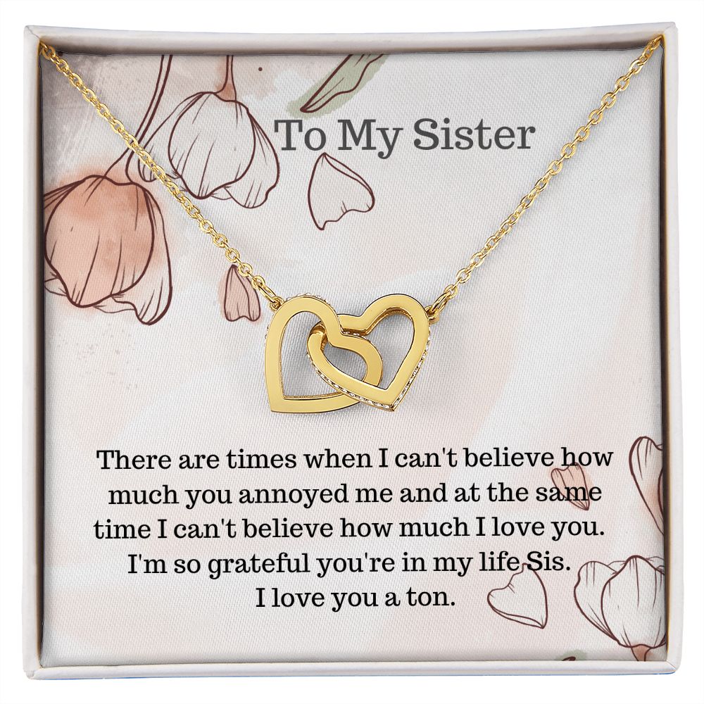 Sis.  To my Sister.  Interlocking hearts necklace
