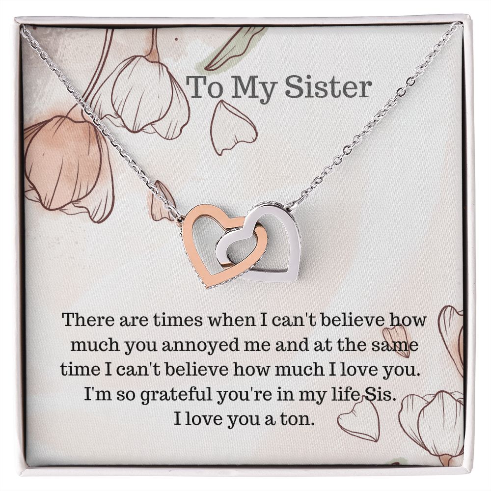 Sis.  To my Sister.  Interlocking hearts necklace