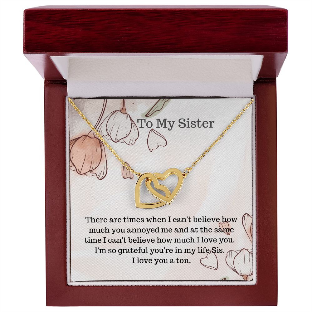 Sis.  To my Sister.  Interlocking hearts necklace