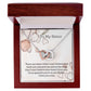 Sis.  To my Sister.  Interlocking hearts necklace