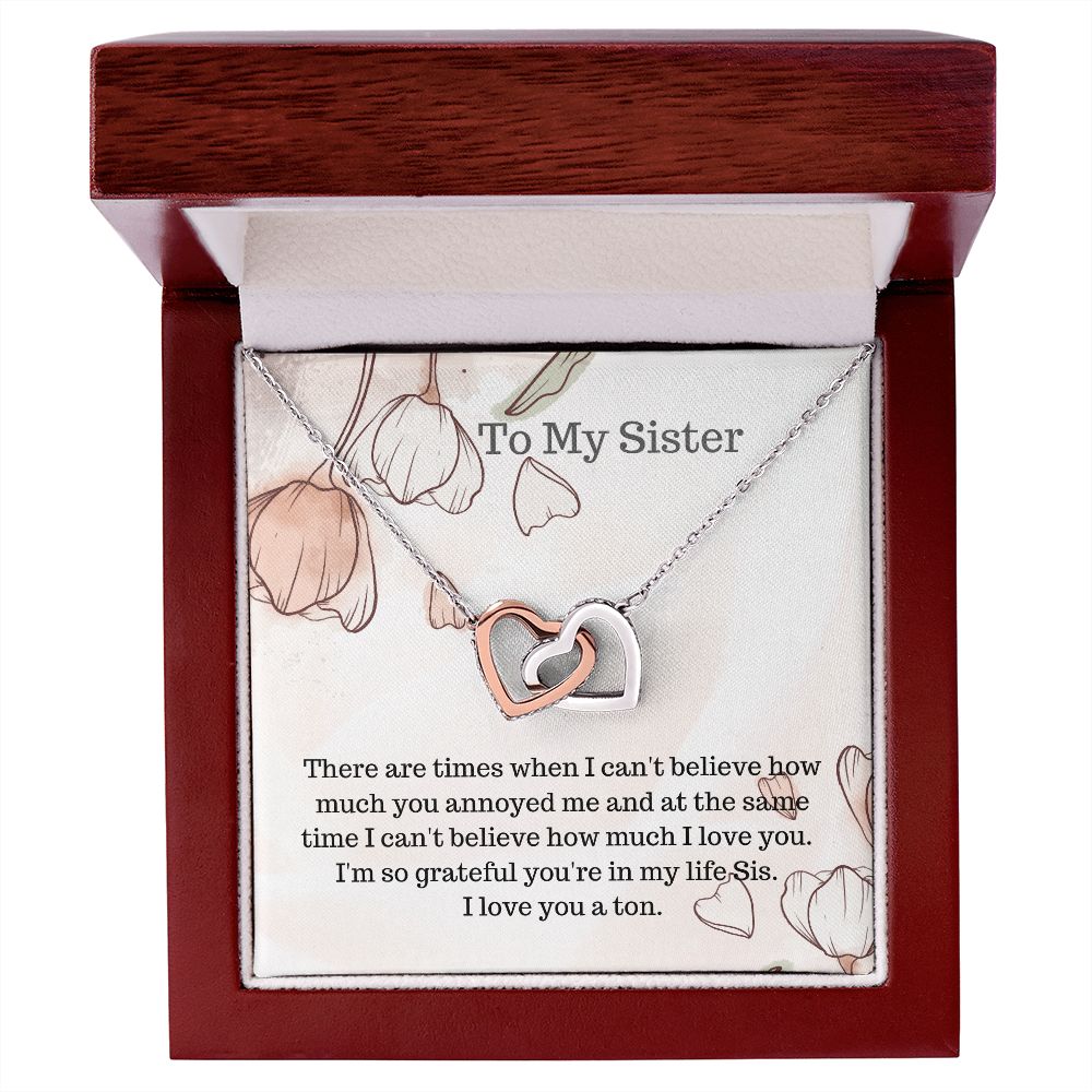 Sis.  To my Sister.  Interlocking hearts necklace